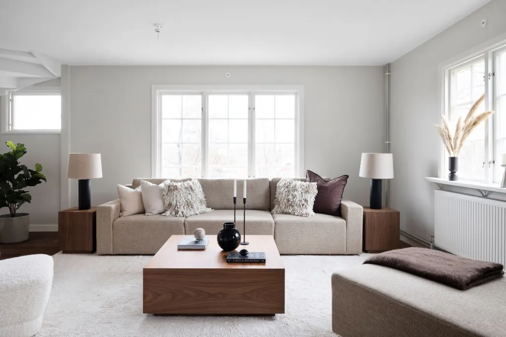 Beige Sofa and Wooden Coffee Table