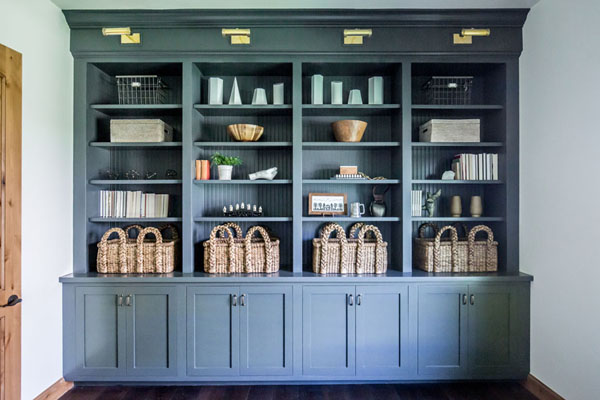 Black Built-In Shelves with Green Decor